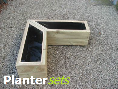 View sets of wooden planters.